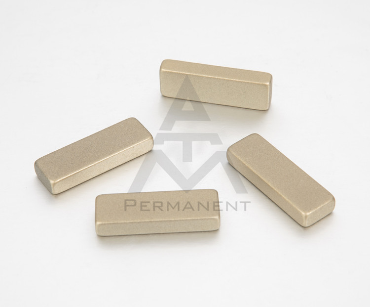Block permanent magnet with Teflon coating