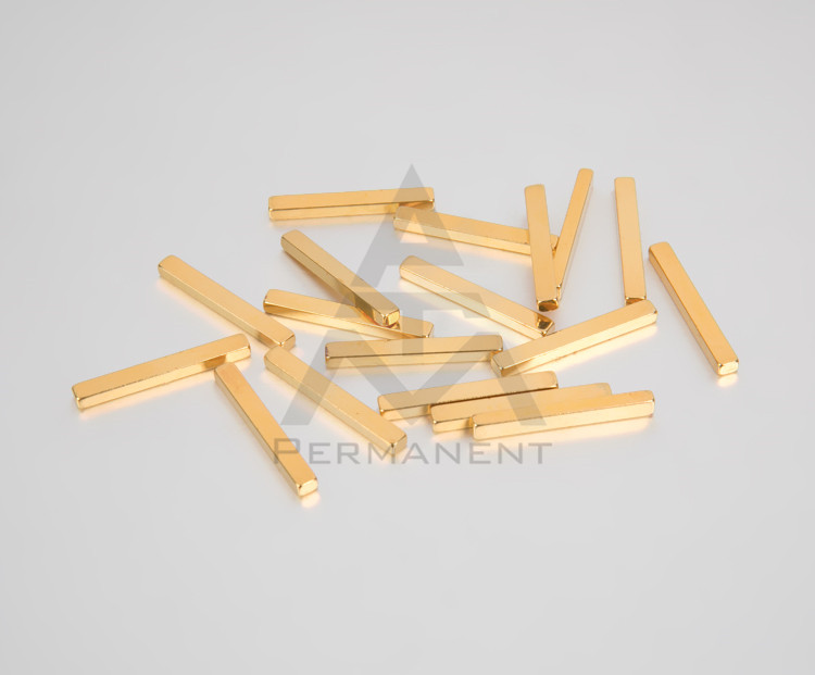 Bar magnet with gold coating